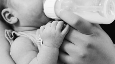 Baby drinking from a bottle