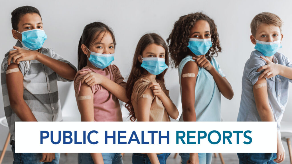 Group of five diverse kids standing in a row wearing blue surgical masks and showing their upper arms with bandages after vaccination. The text PUBLIC HEALTH REPORTS is displayed across bottom.