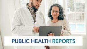 Doctor and patient reviewing something on a tablet