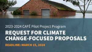 Flooded building with CAFÉ Pilot Program climate proposal ad, due March 15, 2024
