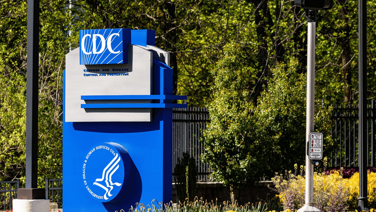 Signage of the Centers for Disease Control and Prevention (CDC) at the entrance of the CDC headquarters in Atlanta, GA
