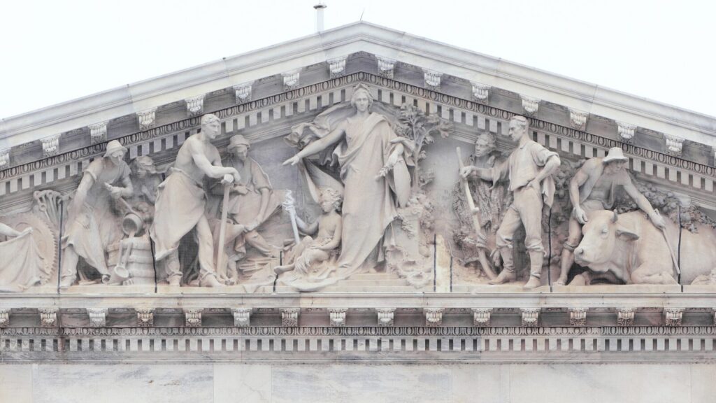 Apotheosis of Democracy_ the sculptural pediment over the House entrance on the U.S. Capitol's east front