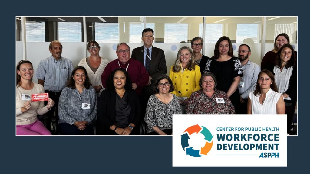 Group photo of ASPPH staff, University at Albany School of Public Health faculty, and NY State Department of Health partners, with ASPPH Center for Public Health Workforce Development logo