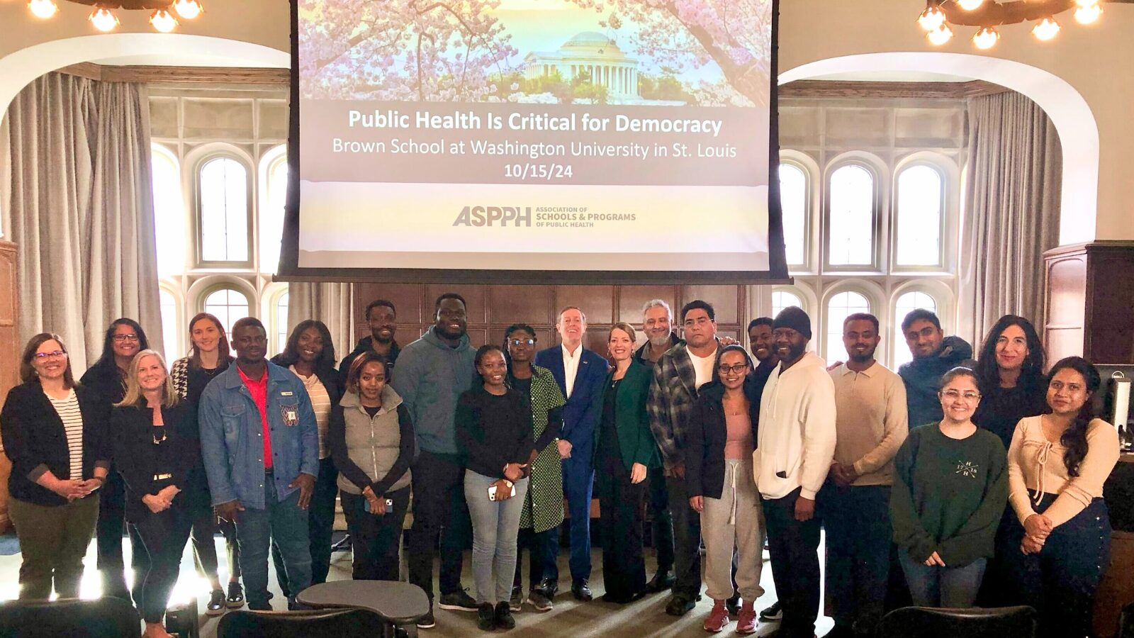 Group photo of public health students and professionals at Washington University in St. Louis after a session titled “Public Health Is Critical for Democracy,” by ASPPH on October 15, 2024