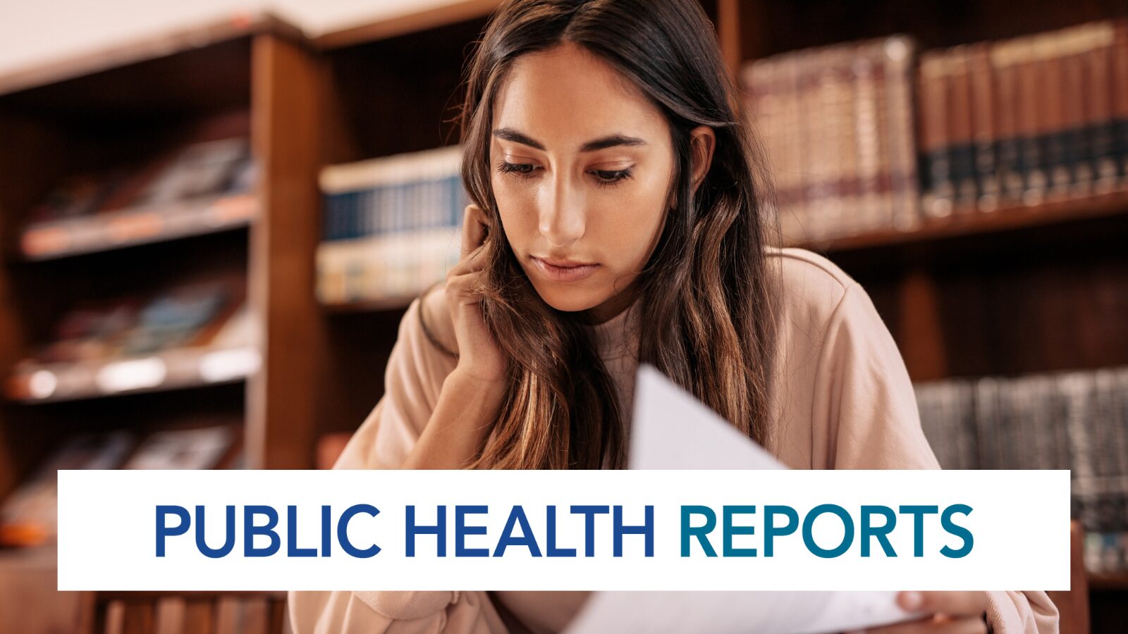 Young woman reading a document labeled Public Health Reports in a library setting with bookshelves in the background, looking focused and thoughtful