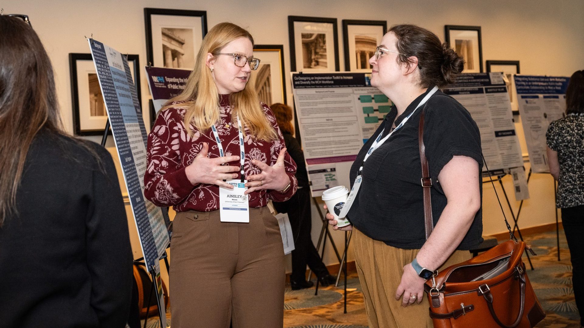 Two public health professionals talking to each other