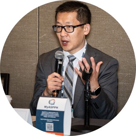 Man speaking into microphone