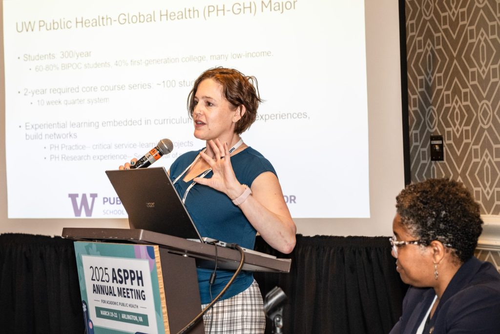 Presenter speaking at a podium