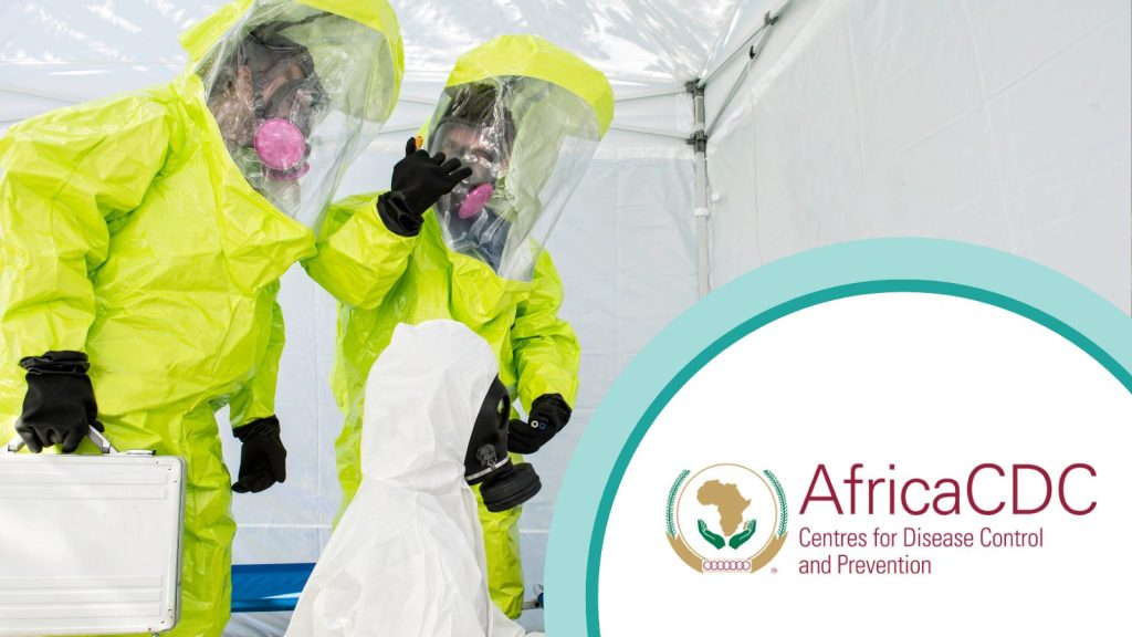 three people in hazmat suits with Africa CDC logo