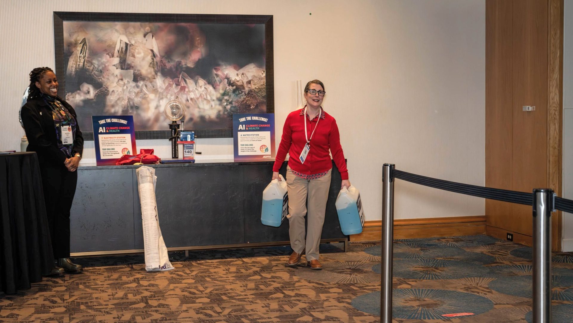 Woman carrying jugs of water