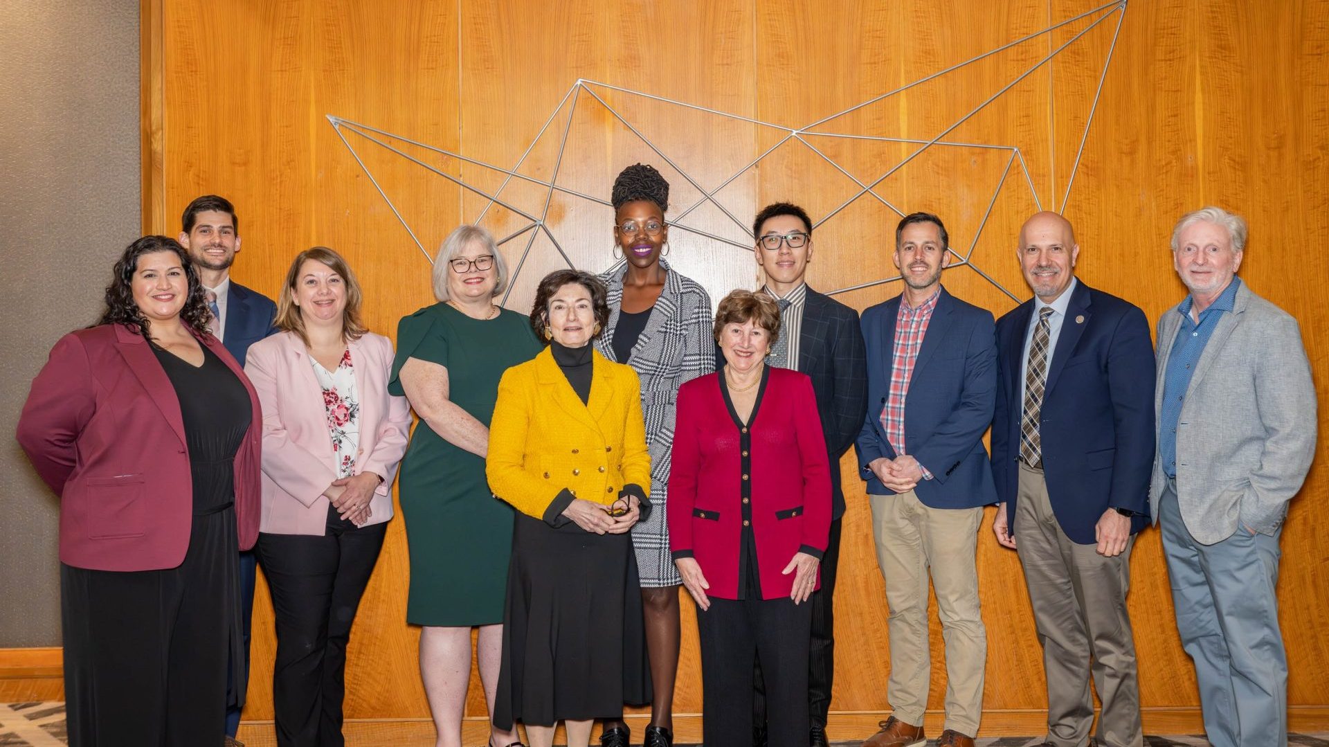 A group of award winners standing together