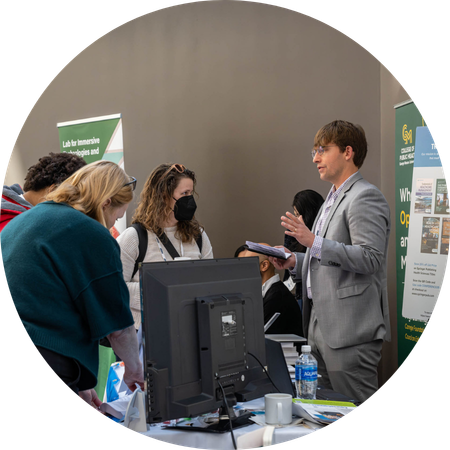 People talking with sponsor representative